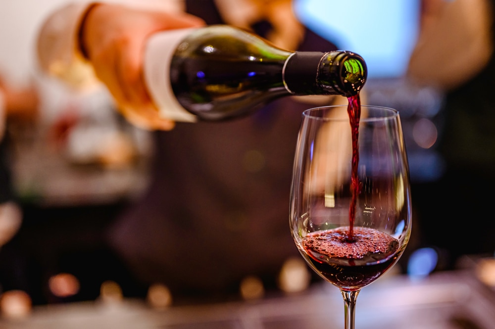 wine being poured at the many great places for wine tasting in McMinnville in Oregon Wine Country