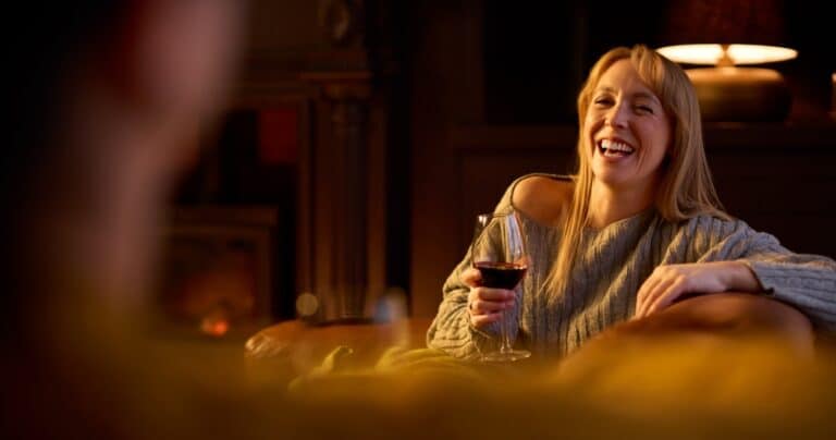 Two women enjoying wine and a winter getaway at our cozy McMinnville Oregon Bed and Breakfast